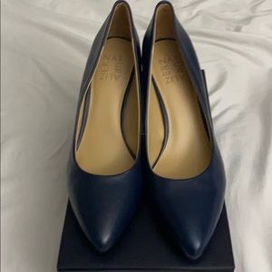 Navy leather pumps